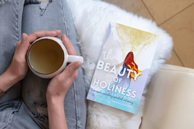 Beauty of Holiness book with a coffee